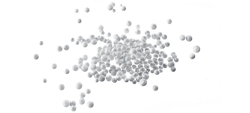 White beads of raw expanded polystyrene