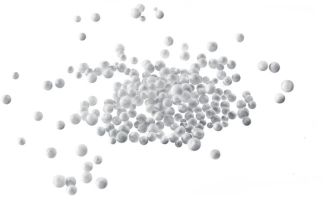 White beads of raw expanded polystyrene