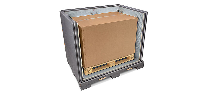 A grey insulated container with an inner carton and cooling elements on a pallet