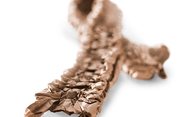 A brown paper cushioning strip