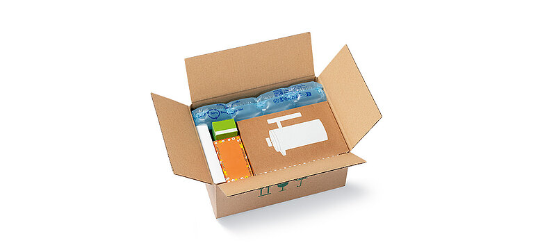 Open cardboard box with protective air cushions